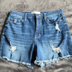 ripped blue jean shorts
